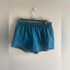 Calia by Carrie Underwood Teal Women's Shorts with Zipper Pockets & Brief Liner
